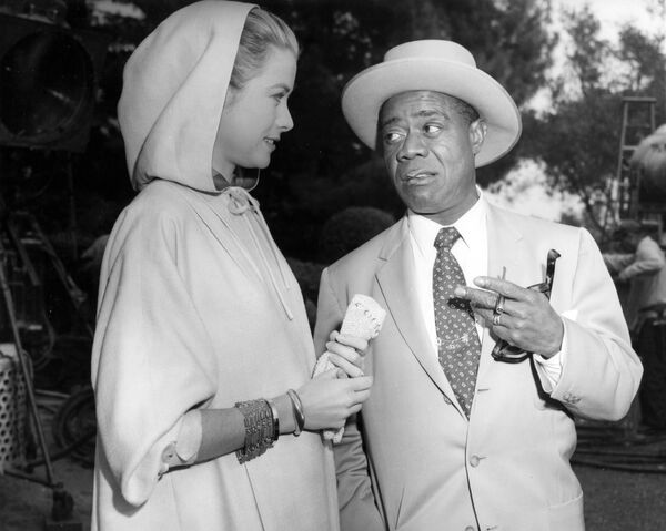 Актриса Грейс Келли с Луи Армстронгом во время съемок в Лос-Анджелесе, 1956 год - Sputnik Латвия