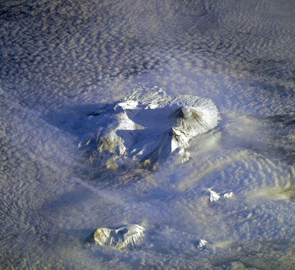 Вулканы Камчатки снятые с борта Международной космической станции - Sputnik Латвия