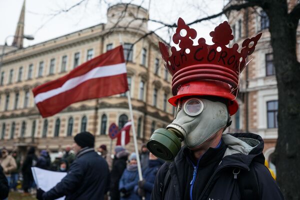 Protesti Rīgā: Latvijas varas patiesie ienaidnieki nav nedz masku nīdēji, nedz krievi Protesti Rīgā: Latvijas varas patiesie ienaidnieki nav nedz masku nīdēji, nedz krievi - Sputnik Latvija