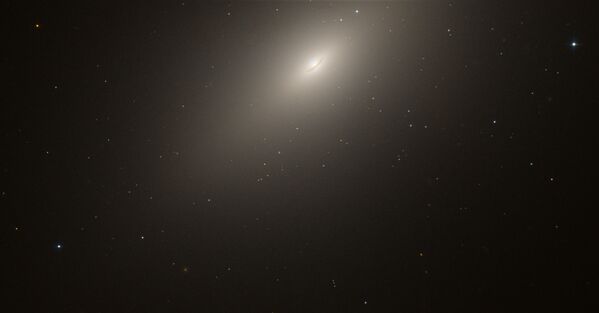 Eliptiskā galaktika NGC 4697 Jaunavas zvaigznājā Eliptiskā galaktika NGC 4697 Jaunavas zvaigznājā - Sputnik Latvija