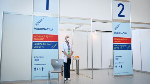 Пункт вакцинации от COVID-19 в Риге - Sputnik Латвия