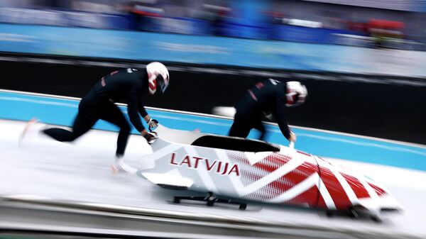 Латвийская бобслейная двойка Оскарс Киберманис / Матис Микнис на Олимпиаде в Пекине - Sputnik Латвия