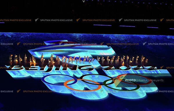 Логотип завершившейся в Пекине Олимпиады. - Sputnik Латвия