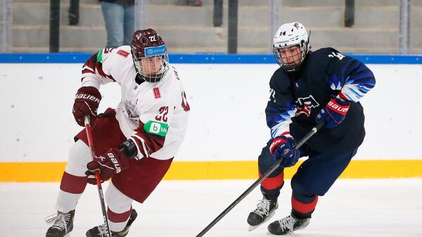 Юниорская сборная Латвии по хоккею уступила сверстникам из США со счетом 13:3 - Sputnik Латвия