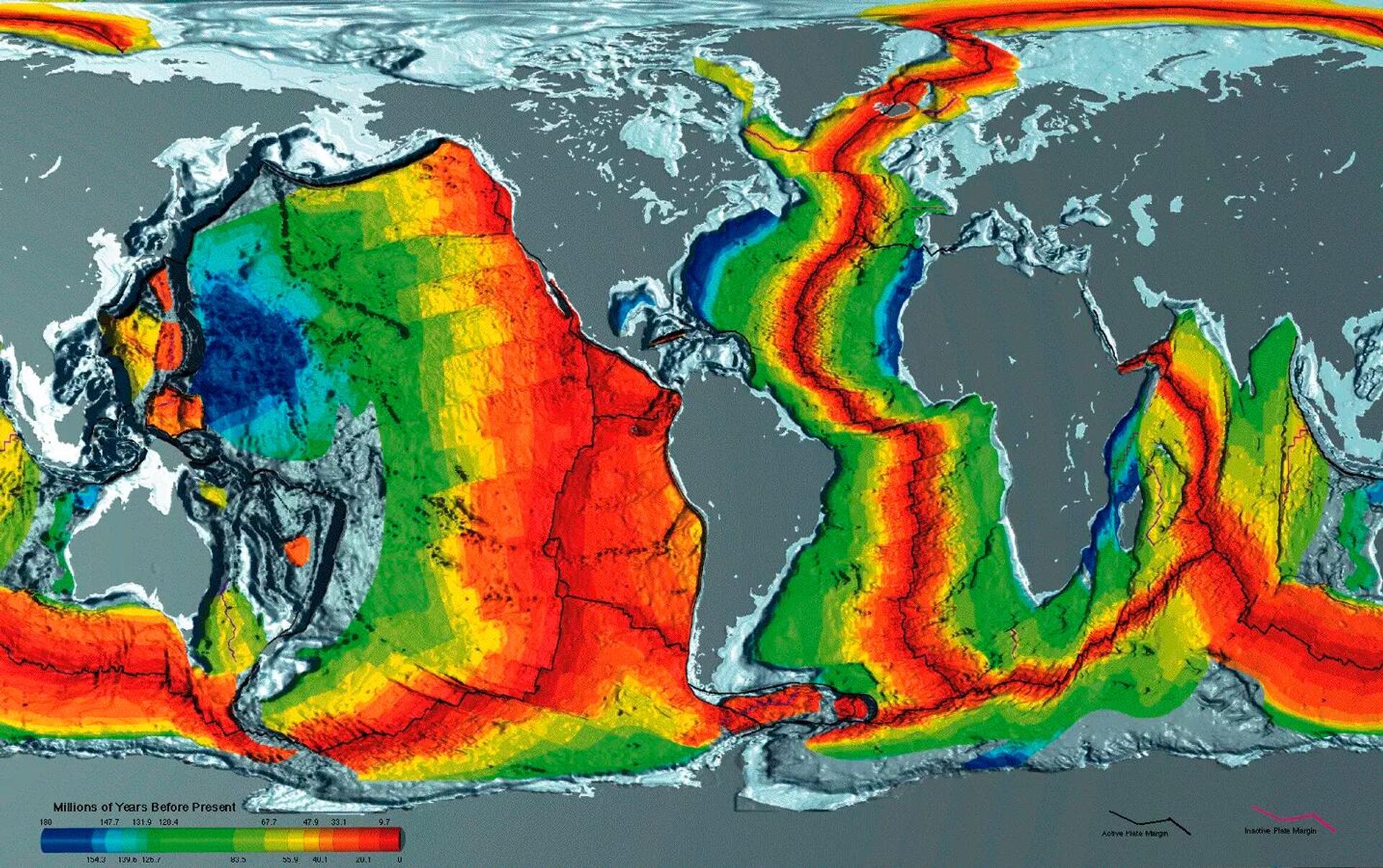 Увеличение возраста дна океанов по мере удаления от срединно-океанических хребтов: красный цвет соответствует более молодой земной коре, синий — более древней - Sputnik Latvija, 1920, 05.06.2022