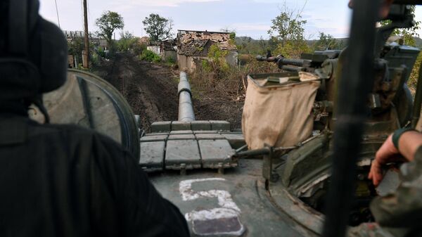 Танковый экипаж Народной милиции ЛНР в зоне спецоперации - Sputnik Латвия