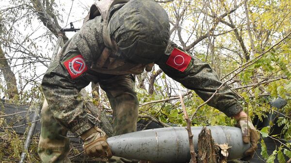 Боец группировки Отважные в зон спецоперации на Украине  - Sputnik Латвия