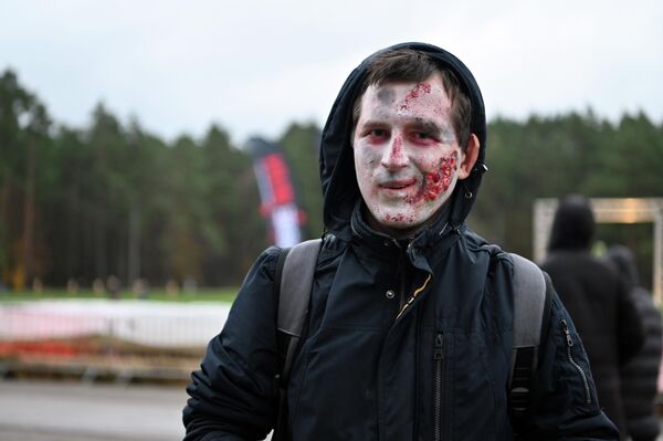 На фото: участник забега Zombie Run 2022. На фото: участник забега Zombie Run 2022. - Sputnik Латвия