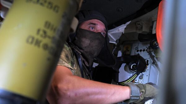 Наводчик-оператор БМП-3 подразделения спецназа ЦВО ВС РФ в зоне спецоперации - Sputnik Латвия