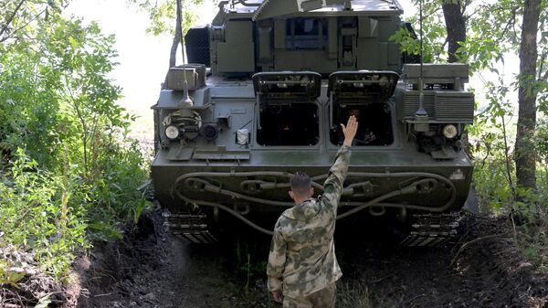 Работа расчета ЗРК Тор-М1 ВС РФ в зоне спецоперации - Sputnik Латвия