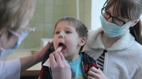 Работа детской поликлиники в Омске в период эпидемии гриппа. Архивное фото - Sputnik Латвия