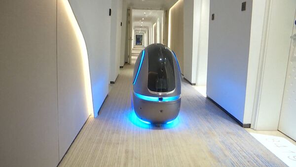 Отель будущего с роботами появился в Китае - Sputnik Latvija