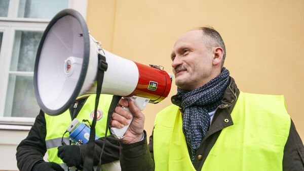 Мирослав Митрофанов на акции протеста в Риге против социального и национального неравенства в Латвии. 12 января 2019 г. - Sputnik Латвия