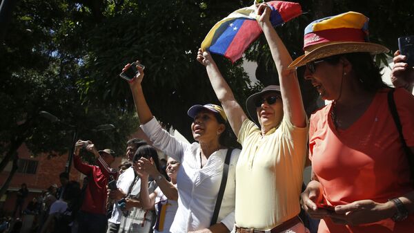 Лидер оппозиции Венесуэлы Хуан Гуаидо выступил на митинге в Каракасе  - Sputnik Latvija