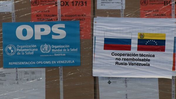Гуманитарная помощь из России прибыла в Венесуэлу - видео - Sputnik Latvija