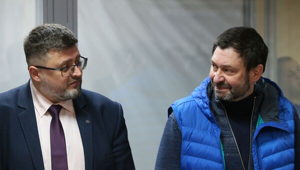 Адвокат Андрей Доманский (слева) и руководитель портала РИА Новости Украина Кирилл Вышинский, архивное фото - Sputnik Латвия