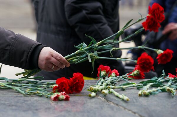 В Саласпилсе в День освобождения узников нацистских концлагерей, 11 апреля 2019 В Саласпилсе в День освобождения узников нацистских концлагерей, 11 апреля 2019 - Sputnik Латвия