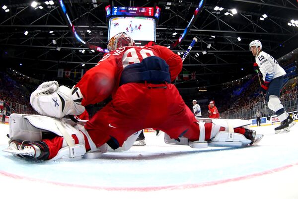 ЧМ-2019: Россия не без труда прошла США, Канада чудом спаслась ЧМ-2019: Россия не без труда прошла США, Канада чудом спаслась - Sputnik Латвия