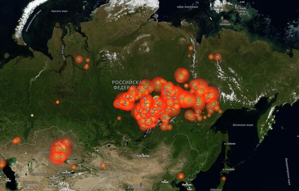 Карта природных пожаров в России по данным сайта fires.ru Карта природных пожаров в России по данным сайта fires.ru - Sputnik Латвия