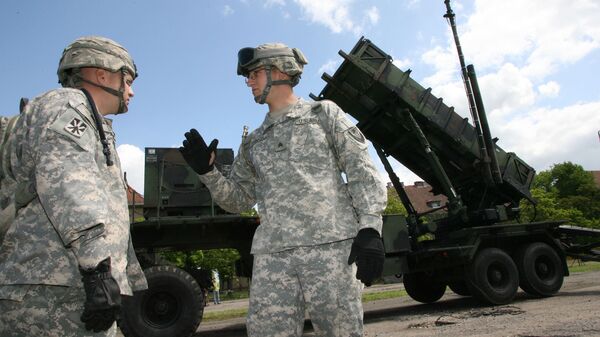 Военнослужащие армии США из расквартированной в Польше батареи ракет ПВО Patriot - Sputnik Латвия