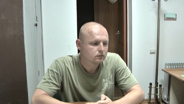 Переводчик миссии ОБСЕ на Украине признался в шпионаже. Съемка ФСБ - Sputnik Латвия