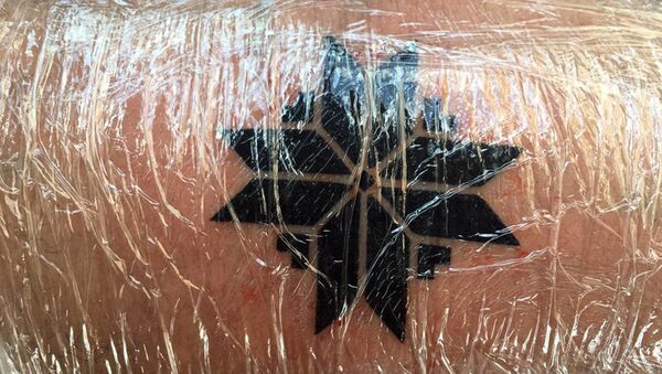 Татуировка на руке Аусеклитис - Sputnik Латвия