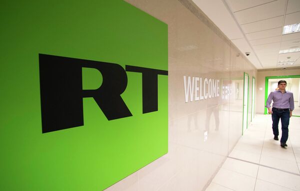 Телеканал Russia Today Телеканал Russia Today - Sputnik Латвия