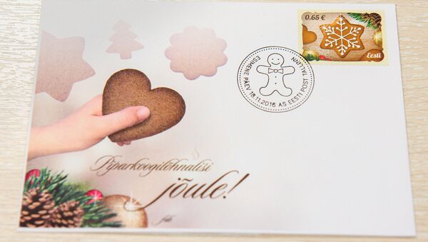 Марка с запахом печенья на рождественской открытке - Sputnik Латвия