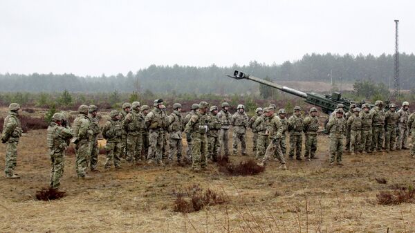 Военные учения НАТО на полигоне Адажи в Латвии. Архивное фото - Sputnik Latvija