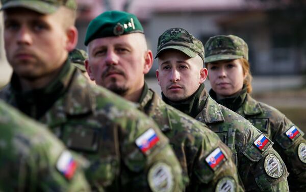 Словацкие военнослужащие на военной базе в Адажи Словацкие военнослужащие на военной базе в Адажи - Sputnik Латвия