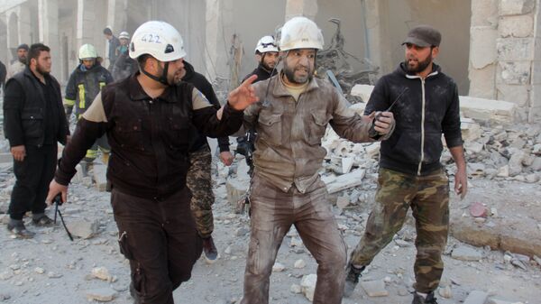 Активисты организации Белые каски в Сирии, архивное фото - Sputnik Латвия