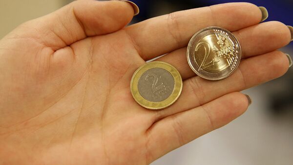 Литовский лит и евро, архивное фото - Sputnik Latvija