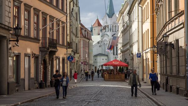 Улица Пилс и Церковь Скорбящей Богоматери в Риге в Латвии - Sputnik Latvija