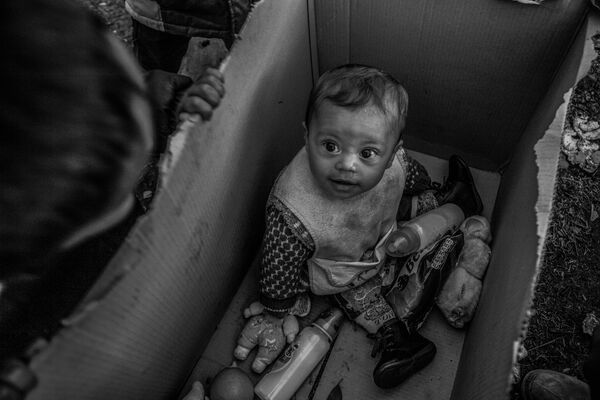 Европейская мечта Анна Пантелия, Греция - 3-е место в номинации Главные новости. Одиночная фотография. Специальный приз Международного комитета Красного Креста (МККК) За гуманитарную фотографию Европейская мечта Анна Пантелия, Греция - 3-е место в номинации Главные новости. Одиночная фотография. Специальный приз Международного комитета Красного Креста (МККК) За гуманитарную фотографию - Sputnik Латвия