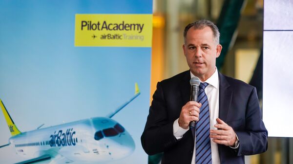 Председатель правления авиакомпании airBaltic Мартин Гаусс - Sputnik Латвия