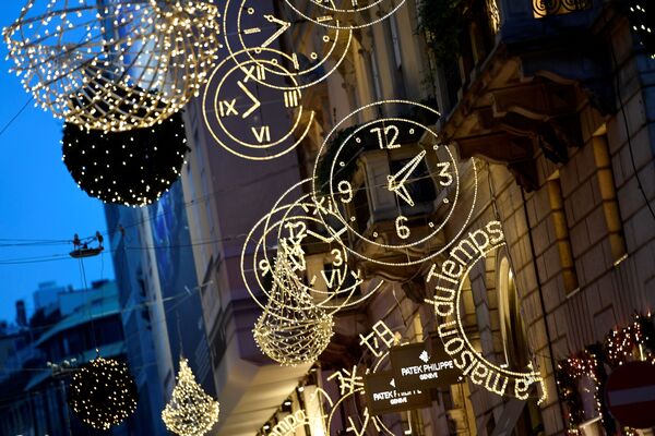 Christmas lights decorations are pictured in the Quadrilatero della Moda, a high-class shopping district, in Milan Christmas lights decorations are pictured in the Quadrilatero della Moda, a high-class shopping district, in Milan - Sputnik Латвия