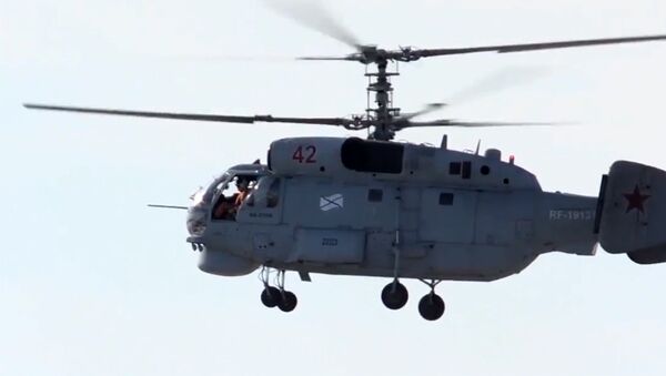 Минобороны РФ обнародовало видео с вертолетами Ка-27ПЛ Северного флота - Sputnik Латвия