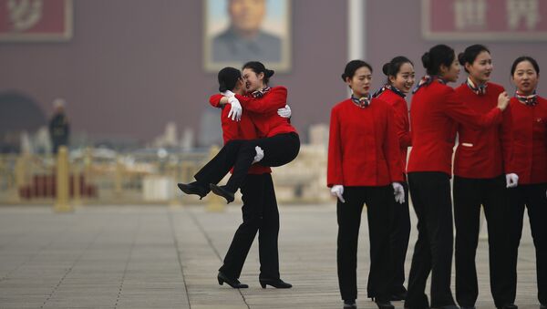 Девушки-хостес на открытии Всекитайского собрания народных представителей в Пекине - Sputnik Латвия