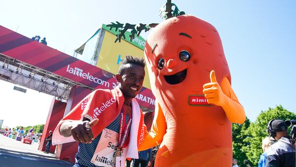 Победитель Рижского марафона  -  Цедат Аяна из Эфиопии - Sputnik Латвия