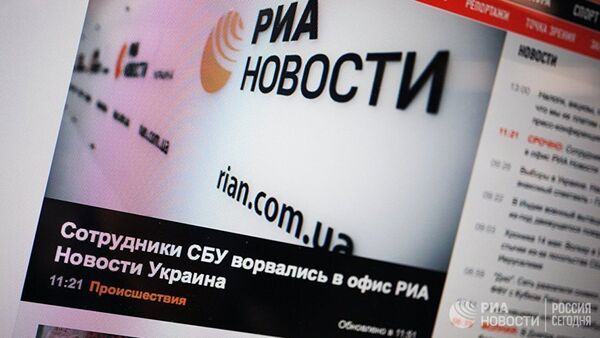 Сайт rian.com.ua на экране монитора - Sputnik Латвия