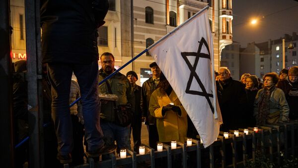 Шествие Памяти в Риге в преддверии Международного Дня против фашизма, расизма и антисемитизма - Sputnik Латвия